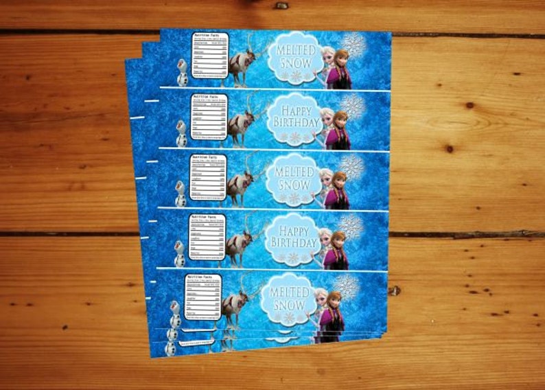 May include: Five blue and white Frozen themed water bottle labels with images of Elsa and Anna, Olaf, and a reindeer. The labels say "Melted Snow" and "Happy Birthday".