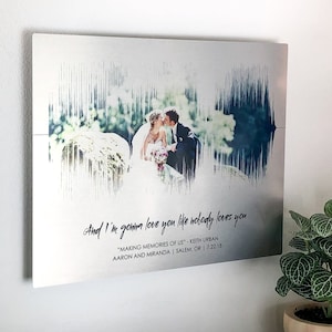 10 year anniversary gift. A photo of a couple is positioned inside the soundwave of a wedding song. It is printed on brushed aluminum and tin panel. Customized with any song and personalized with a lyric and personal text (names, location, date).