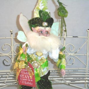 Mark Roberts Mistletoe Sign and Hat, Green Velvet Pants and Hat. White and silver Shirt and Slippers Elf w/ Glasses