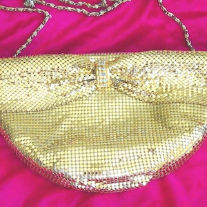 Vintage Gold Metal Mesh evening bag, long strap zip closure, by Evening Mesh. Rhinestone and Gold Bar, gathered like a soft bow.