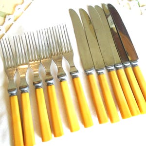 May include: A set of three ceramic mugs with a speckled, matte finish. The mugs are in shades of cream, light gray, and dark gray. Each mug has a simple, minimalist design, perfect for coffee or tea.