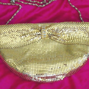 Gorgeous Vintage Gold Metal Mesh evening bag, long strap zip closure, by Evening Mesh. Rhinestone and Gold Bar, to gather like a soft bow.