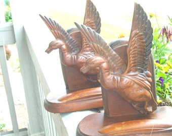 Bookends, Wood Goose Flying, Carved Goose In Flight Bookends.  13.75" x 8" x 3.5 deep. Green Felt bottom.