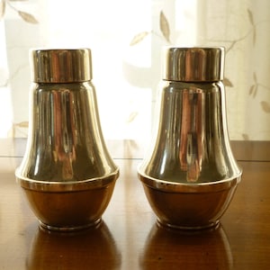 Sterling Silver Salt and Pepper shaker set. Duchin Creation ~ 2.75" high and a bit over 1.5" wide. Glass inserts. Vintage 1960s