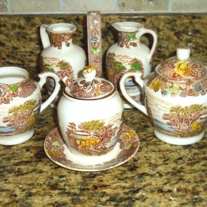 Nasco Transferware in Mountain Woodland pattern. 9 Piece Set, Vinegar & Oil, Jam Jar, Spoon and Lid, Creamer and Sugar Bowl.