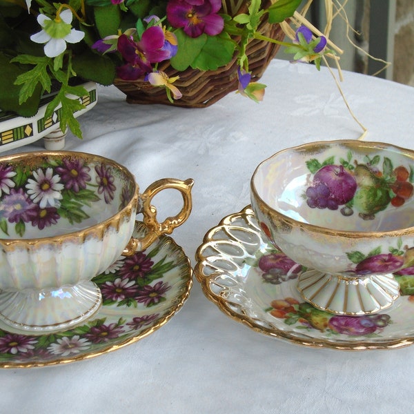 2, Opalescent Teacup Sets, Pearlized Fruit Motif, Reticulated Saucer, Gold Trim. Pearlized Purple,White Asters Motif, footed, fancy handle