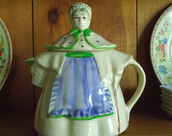 Shawnee Pottery teapot - Granny Ann, 8.5 x 6 x 9", Granny w/Polka Dot Cape and Hat, Blue Apron. Patented, Granny Ann, USA.