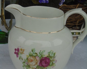 Ironstone China Pitcher - Vintage 1900's Victorian Pitcher Gold Trim. Pitcher measures 7.25" tall x 8.5" spout to handle x 7" wide.