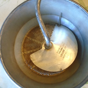 Vintage Foley Food Mill w/ Red Wooden Handle/Foley Food Mill/Potato Ricer/Masher, 2 Hooks to secure over pot or bowl.