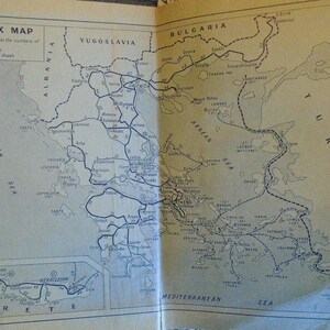 May include: A black and white map of Greece with the title "Index Map" and the text "The figures refer to the numbers of the chapters. Main Roads, Boundary Roads". The map shows the regions of Greece, including Crete, and the Aegean Sea.
