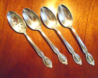 4 Serving Spoons, Wm. Rogers Precious Mirror Silverplate. 1 Slotted, 3 Vegetable Spoons.
