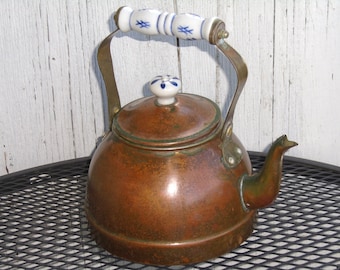 Copper Kettle Blue and White Ceramic Handle and Lid Top.
