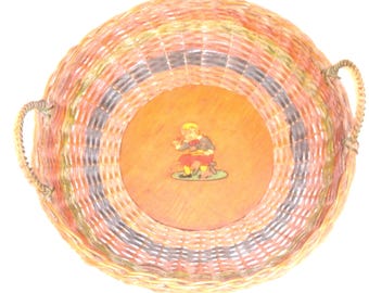 Little Jack Horner, Woven Basket Tray, Nursery Rhyme Wood Base with decal of Little Jack Horner. Woven Green, Red, Tan. Two Handles. 1940s