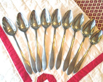 8 Soup Spoons, SILHOUETTE Pattern. 8 Stainless Soup/Place Spoons Plus 1 Teaspoon. 9 Spoons, Lightly used.