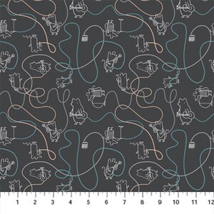 May include: A black fabric with a repeating pattern of white line drawings of a cat playing a guitar. The cat is connected to a microphone by a pink, blue, or black cord.