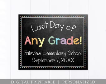 May include: A rectangular chalkboard sign with a colorful dotted border. The text reads Last Day of Any Grade! in white and multicolored letters, followed by Fairview Elementary School and September 7, 20XX in white, sans-serif font.