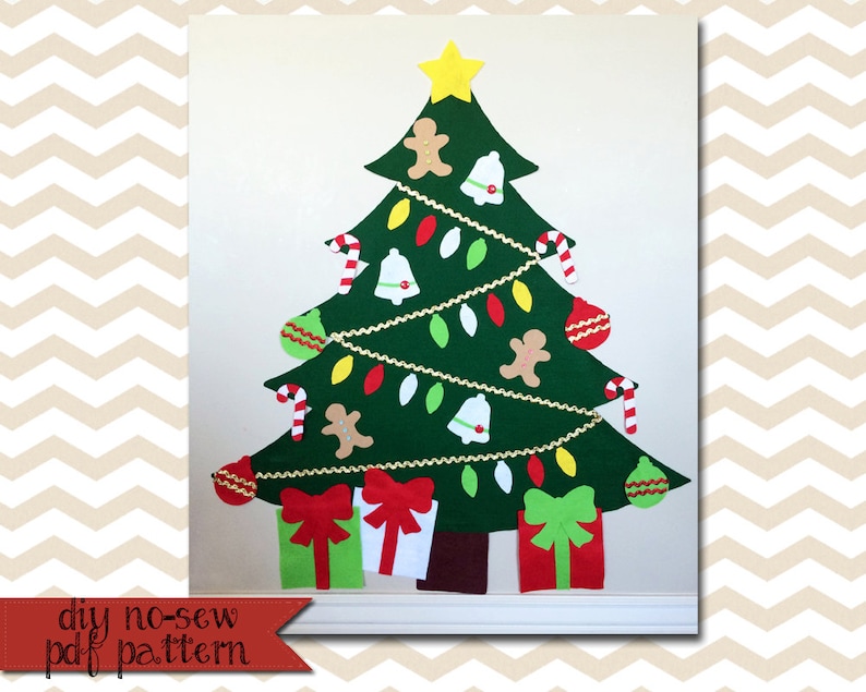 May include: A felt Christmas tree with ornaments, candy canes, gingerbread men, and lights. The tree is green with a brown trunk and a yellow star on top. The text "diy no-sew pdf pattern" is at the bottom of the image.