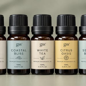 May include: Seven amber glass bottles with black caps, each containing 10ml (0.33 fl oz) of premium fragrance oil. Labels feature the brand name gss and scents: Bamboo Serenity, Pure Line, Coastal Bliss, White Tea, Citrus Oasis, Sea Salt Breeze, and Sea Suite.