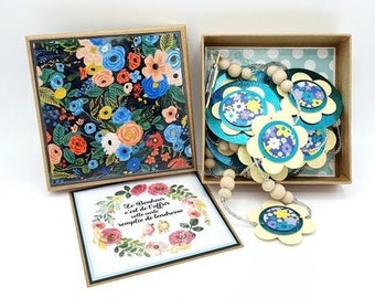 Garland Rounds and flowers in blue and yellow fancy paper with rock beads and wooden pearls and kraft box cotton floral fabric