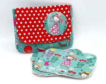 Red fabric pouch with white polka dots and girl print with its 4 matching wipes