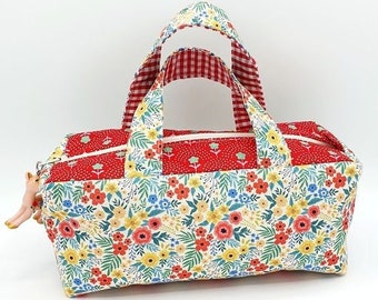 Red floral fabric kit with handles and suede charm