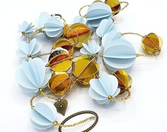 Garland of balls in blue and gold paper and rock beads