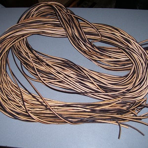 One pair of 42" two tone brown rawhide leather boot / shoe laces - Steamboat Leather & Supplies