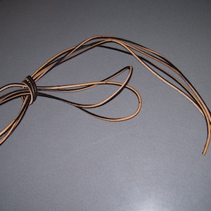 One pair of 40" two tone brown rawhide leather boot / shoe laces - Steamboat Leather & Supplies