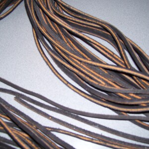 One pair of 42" two tone brown rawhide leather boot / shoe laces - Steamboat Leather & Supplies