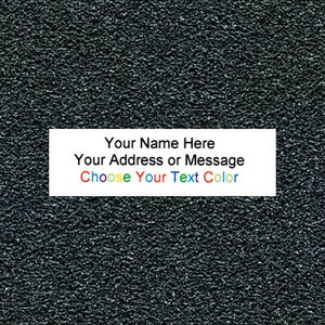 May include: A black textured background with a white rectangle containing the text "Your Name Here Your Address or Message Choose Your Text Color". The text "Choose Your Text Color" is in rainbow colors.