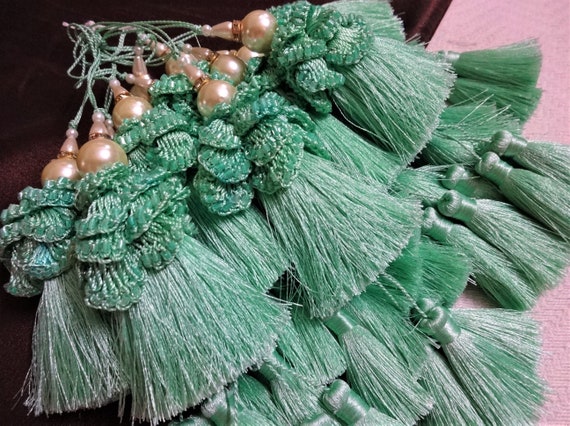 CROCHET LAYERING PIECE WITH LONG TASSELS TANAMI ROAD