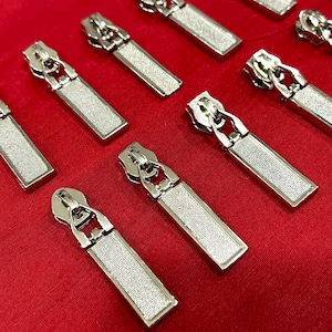 Tirador de cremallera rectangular de metal con acabado plateado para bolsos, carteras, ropa, cadena india para bolsos (15 unidades)