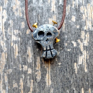 Necklace made of wood and golden screws. Handmade and unique.