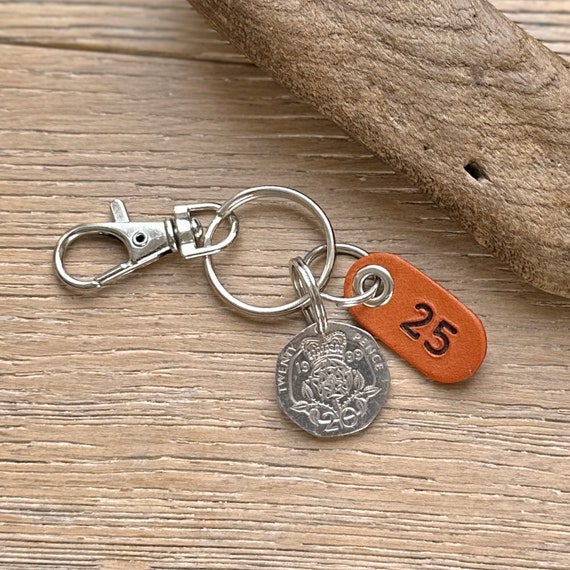 25th birthday or anniversary gift, 1999 UK coin clip style Key ring or bag charm, with a leather number 25 tag