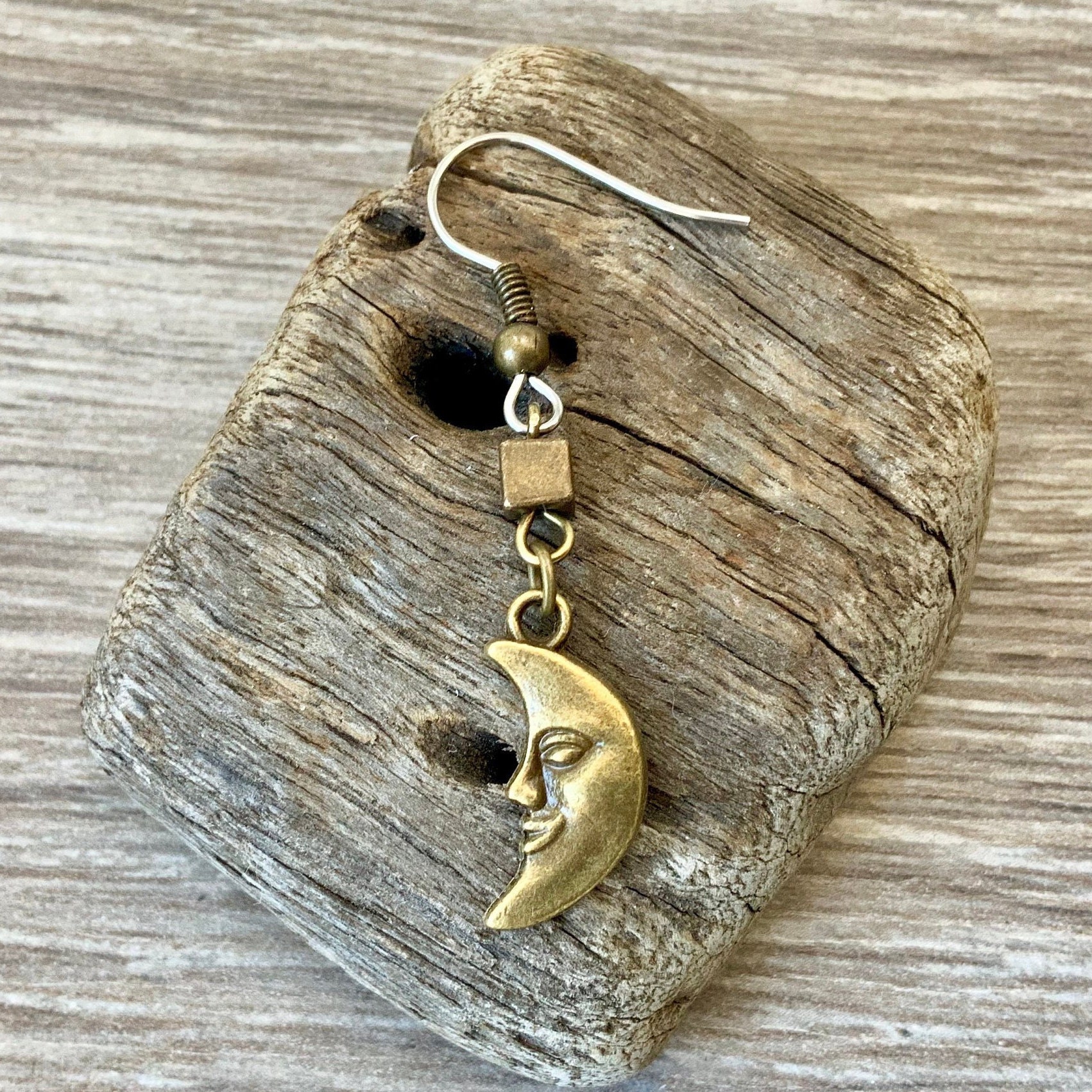 Moon dangle earring, available as a single earring or a pair of