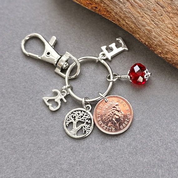 25th birthday gift, 1999 lucky penny, British one pence coin bag charm clip, with a choice of birthstone colour and initial charm