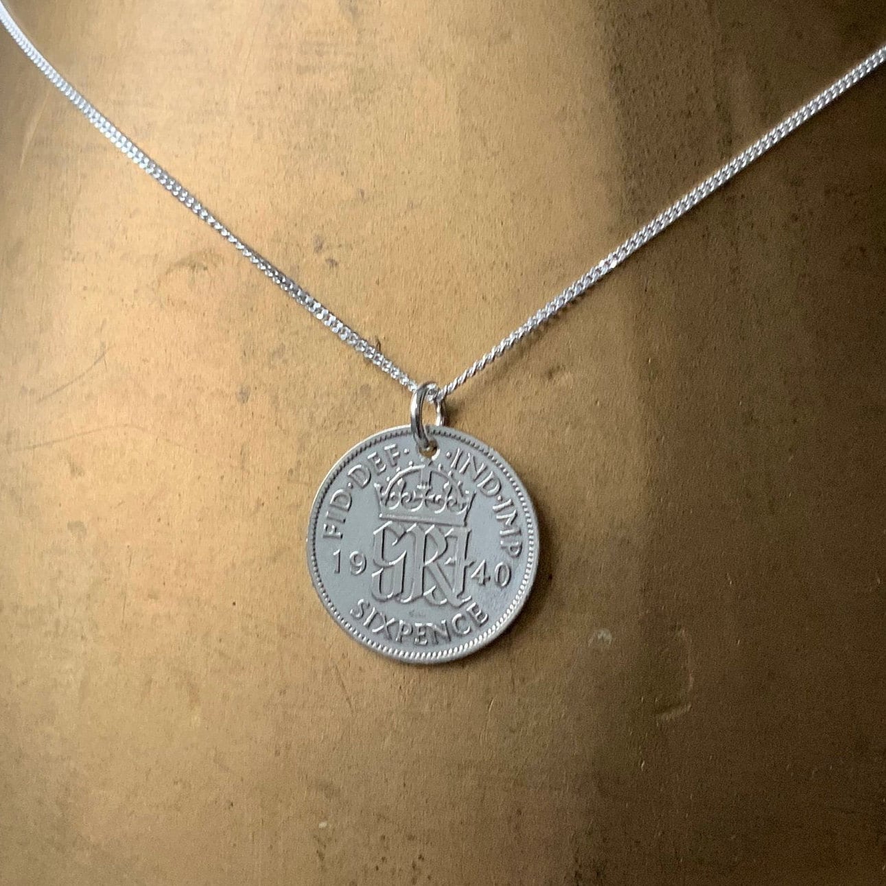 Lucky Sixpence Pendant Necklace on a 