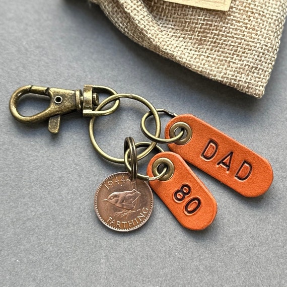 80th birthday gift for dad, a British Farthing from the year 1944 with two antique style leather fobs a great 80th birthday