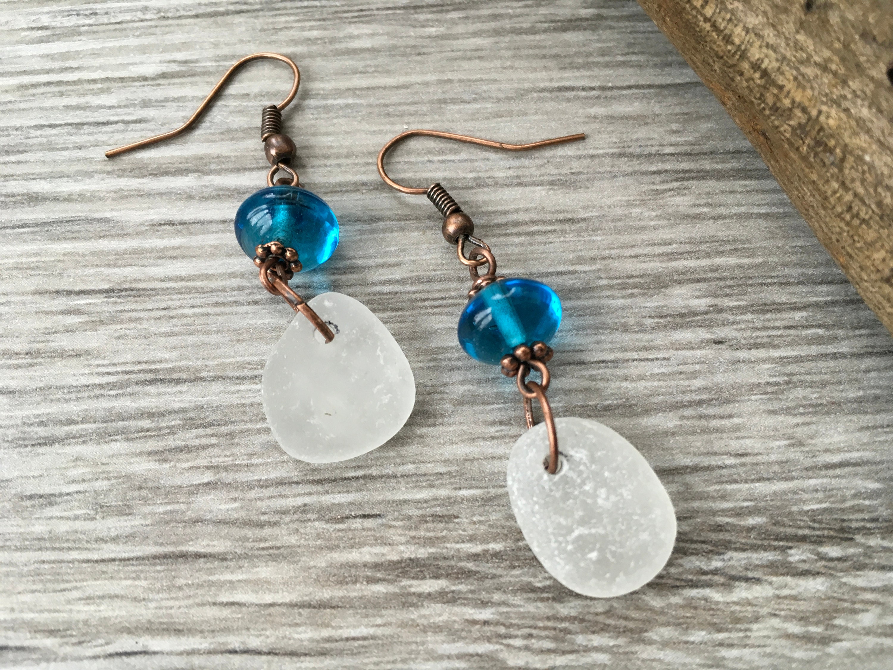Sea glass earrings with blue glass bead, unusual gift, beach glass ...