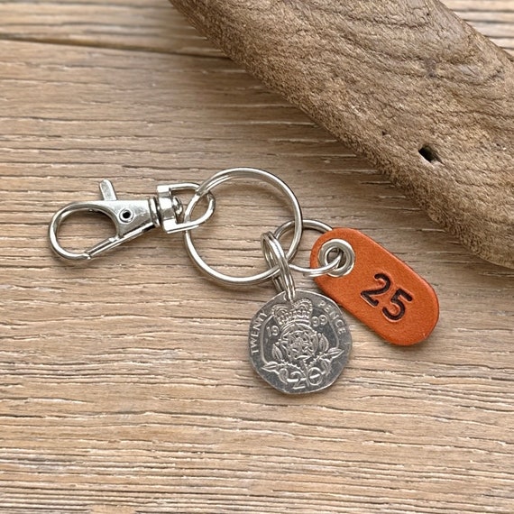 25th birthday or anniversary gift, 1999 UK coin key ring clip, bag charm, with a leather number 25 tag