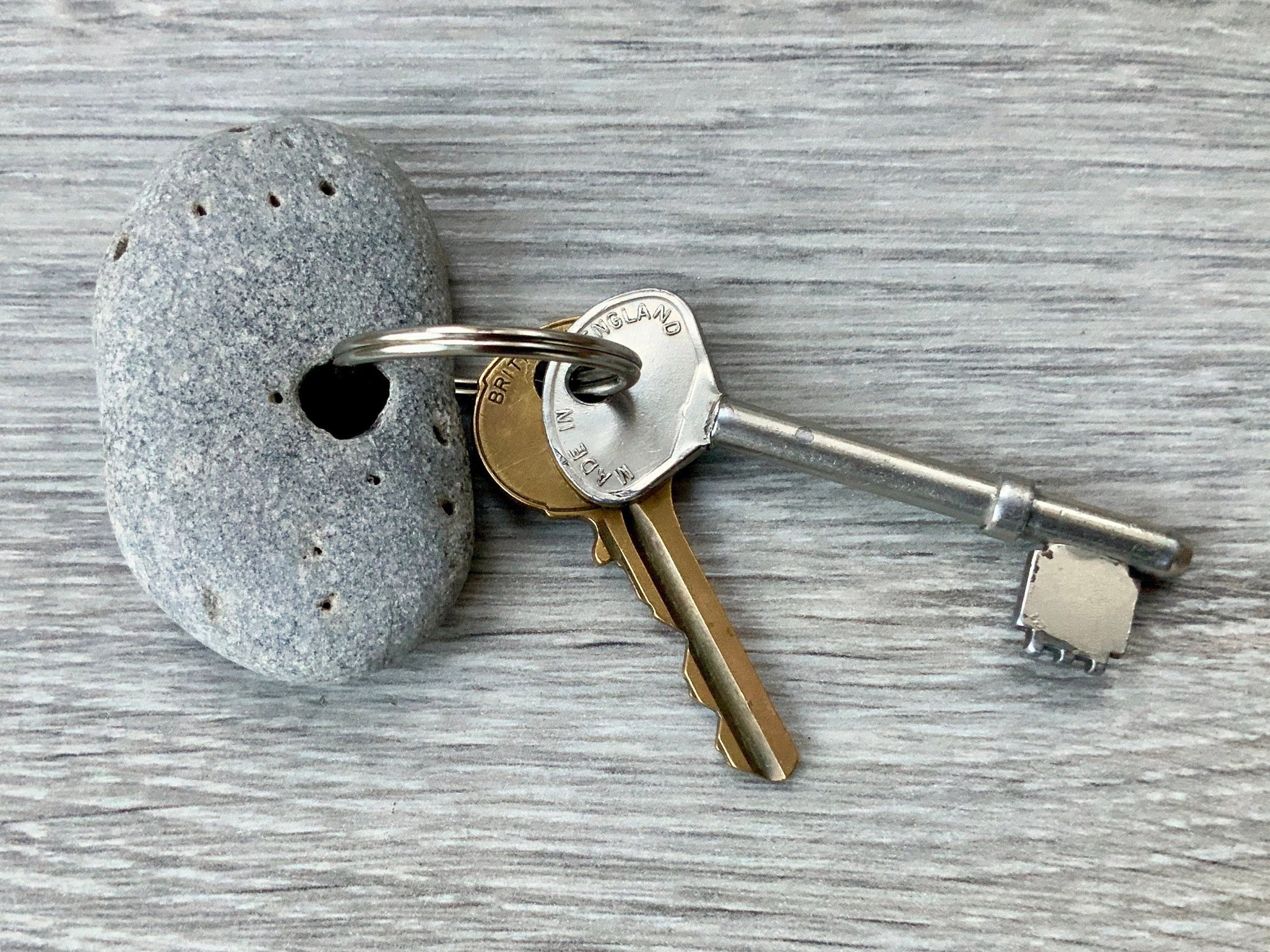 Hag stone keyring, Pebble with a natural hole keyring, rock key chain