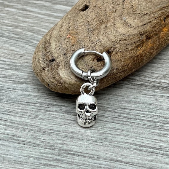 skull thick hoop earring, available as a single earring or a pair of earrings