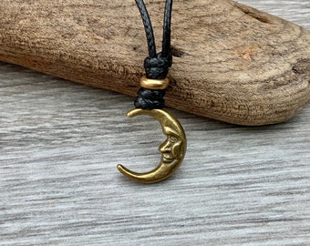 Bronze man in the moon adjustable necklace on a black cord