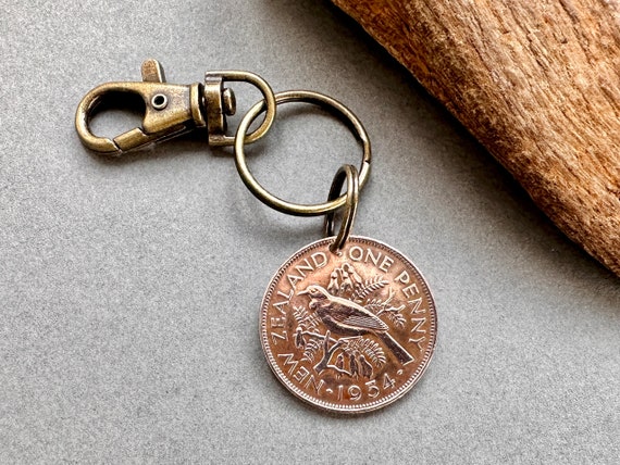 70th birthday or anniversary gift 1954 New Zealand penny keyring, keychain, or clip, NZ Tui bird coin