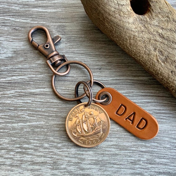 A gift for dad, a British half penny in the year of your choice with an antique style leather fob.