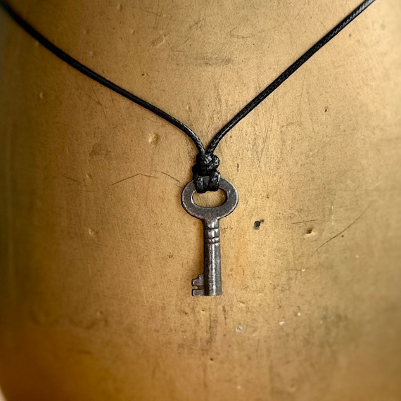 Small Vintage skeleton key necklace, simple necklace on an adjustable black cord