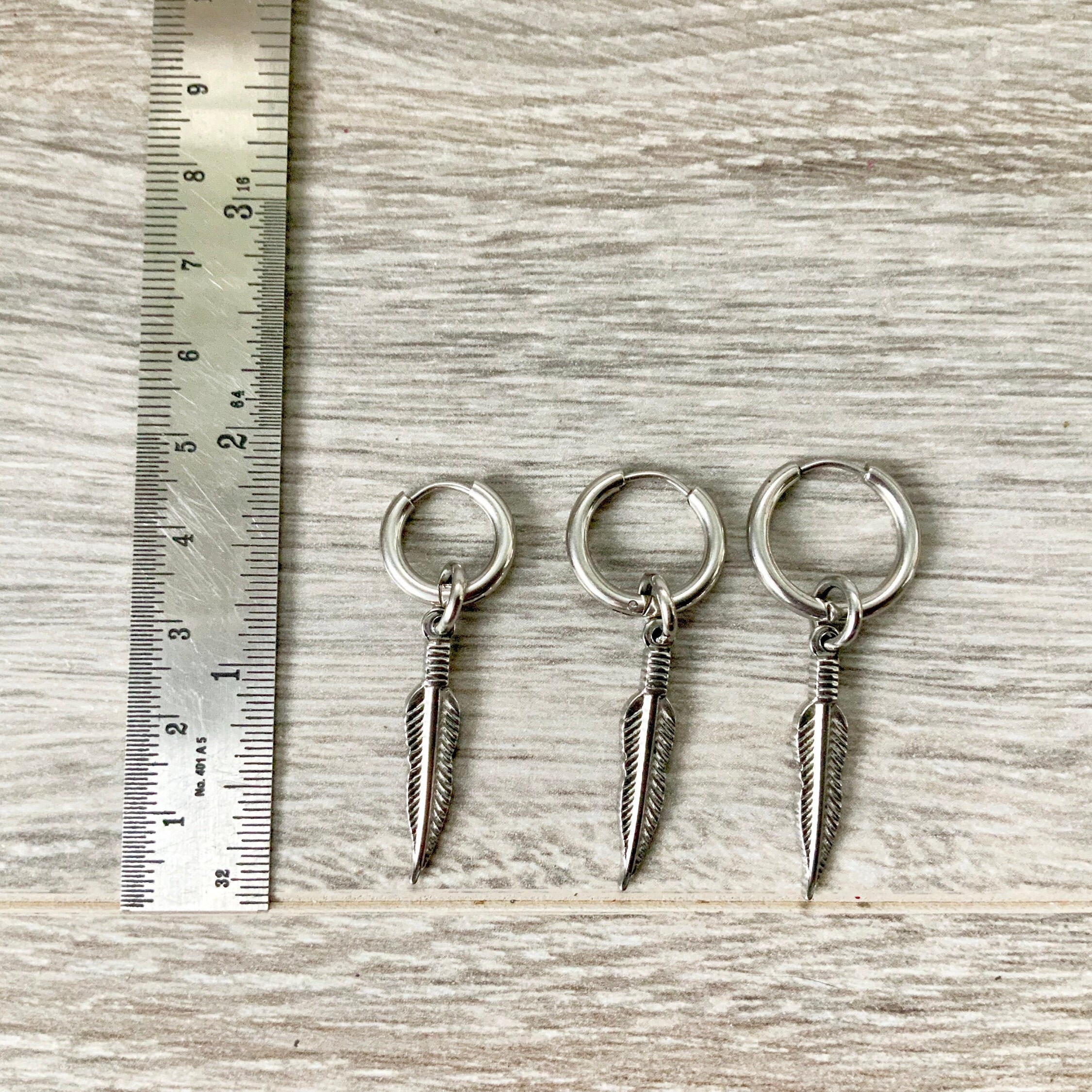 feather thick hoop earring, stainless steel, available as a single