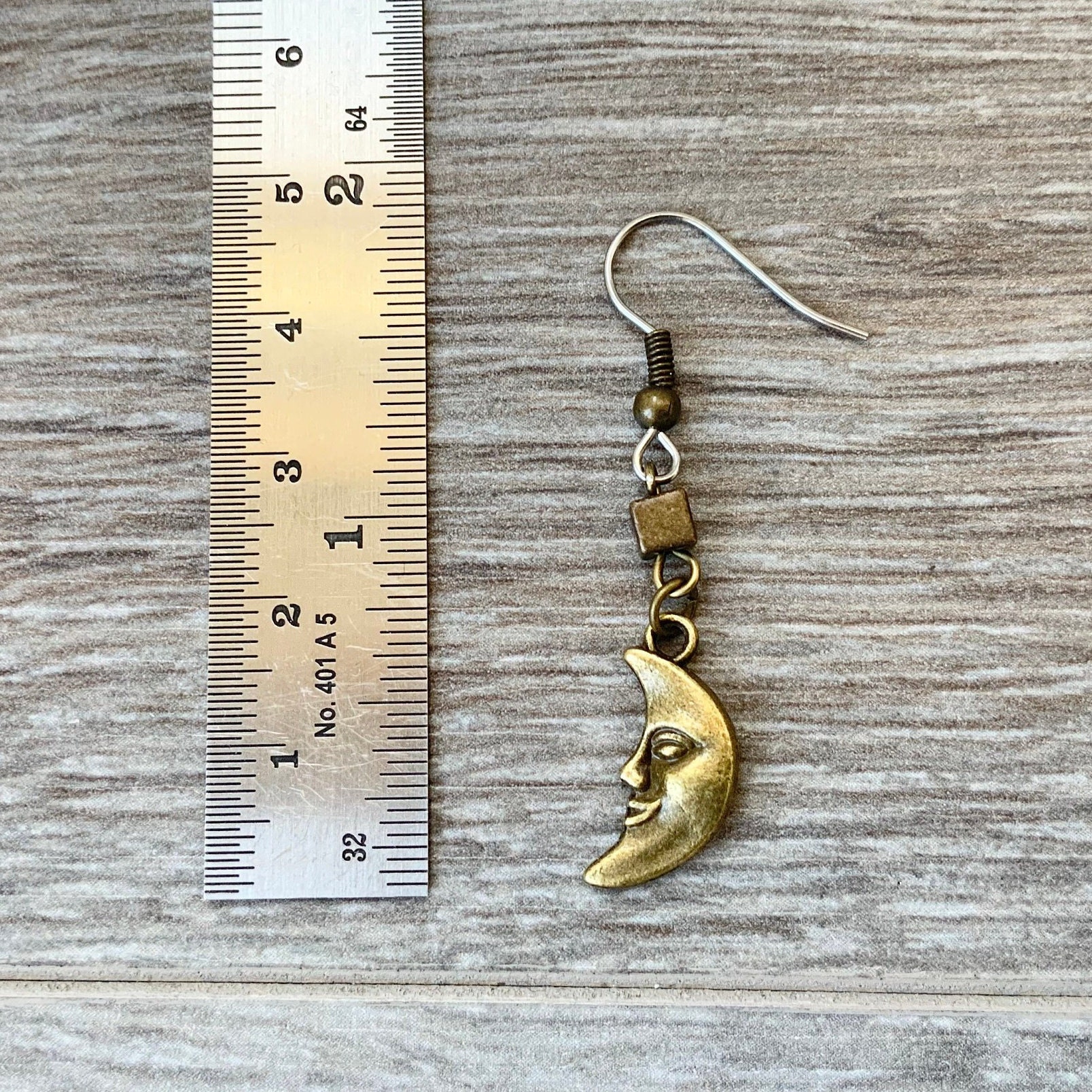 Moon dangle earring, available as a single earring or a pair of