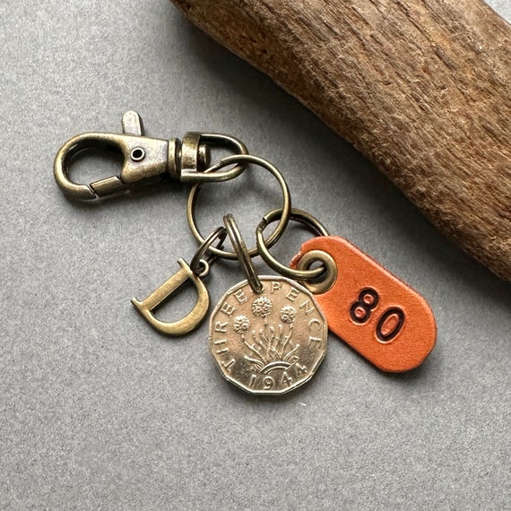 80th birthday gift, 1944 British threepence coin with a choice of initial and number 80 leather tag with keyring or clip fastening