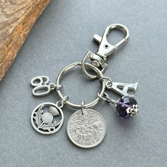 Scottish 60th personalised birthday gift, 1964 sixpence with a thistle charm, bag charm clip, choose initial and birthstone colour,